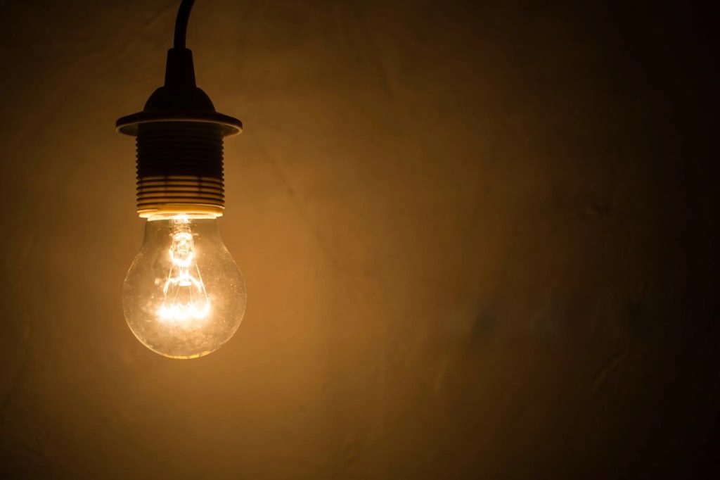 Vintage lightbulb glowing